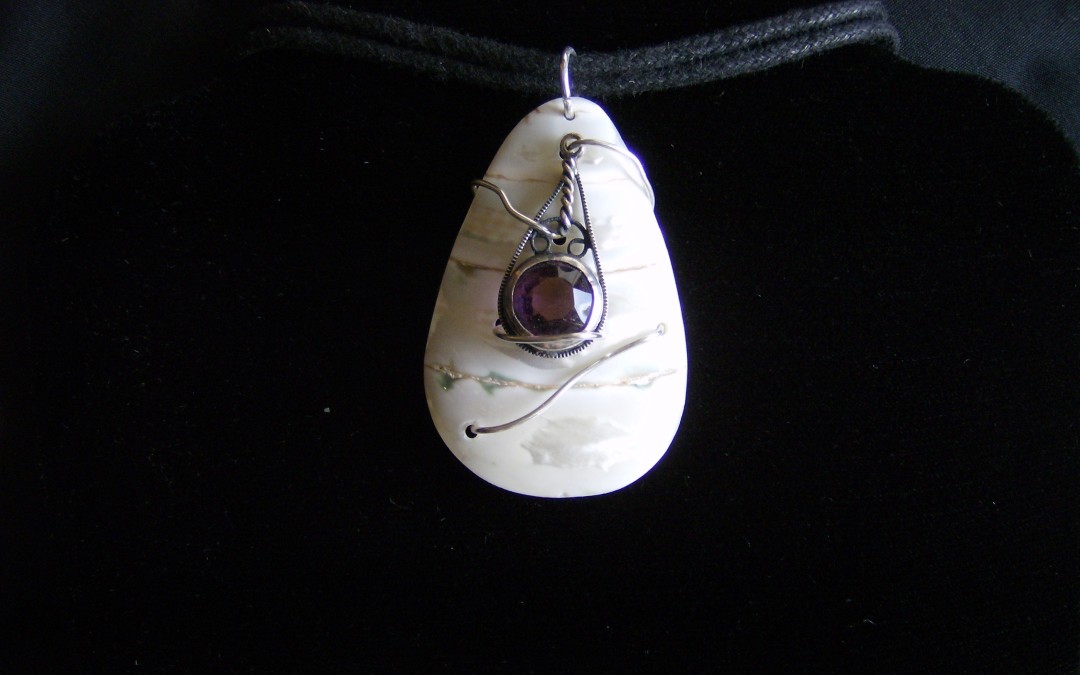 Modern, contemporary design sterling silver,Mother of Pearl, vintage amethyst pendant on cotton cord adaptable to chain or omega. SOLD