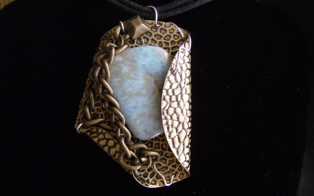 Modern design, larimar & brass pendant adaptable to chain or omega. SOLD